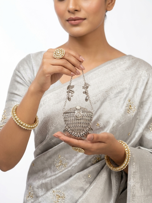 The Sunburst & Cowrie Shell Mini Clutch